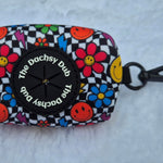 The one with the checkered print poo bag