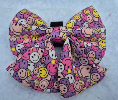 The one with smiley faces sailor bow