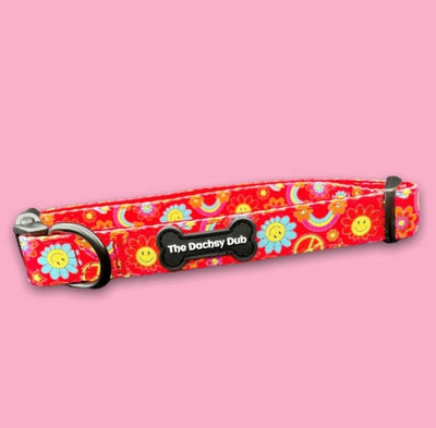 The one with the smiley faces collar