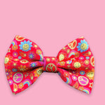 The one with the smiley faces bow tie