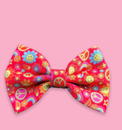 The one with the smiley faces bow tie
